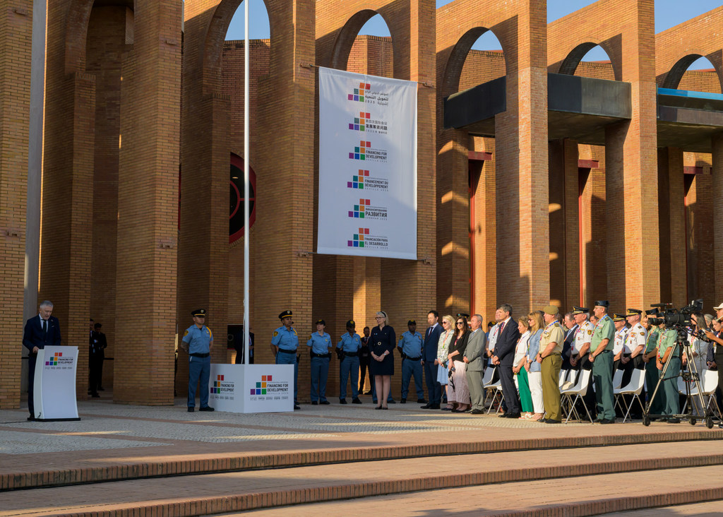 Remarks are delivered after the UN and Spanish flags are raised at the Financing for Development Conference in Sevilla.